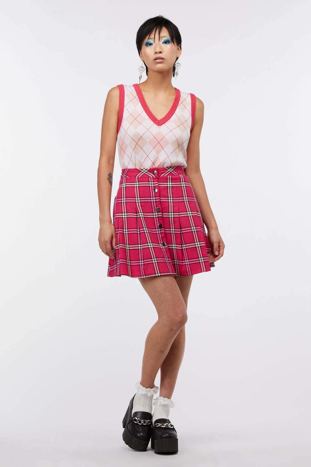 Plaid skater shop skirt in store